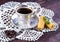 Waffles, mint, coffee beans and coffee on a wooden background.