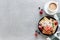 Waffles plate on table with blueberry, strawberry, mint and white cup of coffee