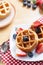 Waffles with strawberry and blueberry and caramel sauce