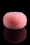 Wagashi Mochi with Pomegranate with honey on black background.