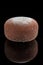 Wagashi Mochi with Truffle with Cherry on black background.