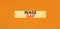 Wage gap symbol. Concept words Wage gap on beautiful wooden stick on a beautiful orange table orange background. Business, support