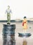 Wage inequality concept  with male and female figurines on coins