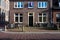 Wageningen, Gelderland, The Netherlands, Brick stone residential facades of student homes with bikes in front