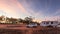 Wagin, Australia - Mar 12,2021: A large white caravan and modern 4WD vehicle free camp next to the nearly dry salt Lake Norring