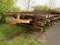 Wagon with extracted old railways. Concrete and wooden sleepers with rail rods