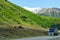 Wagon with a load on a mountain road in a picturesque place