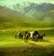 Wagon train on green fields