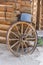 Wagon wheel and pot outside restored cabins Bluff Fort Utah