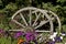 Wagon wheels in flower garden