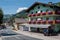 WAGRAIN, AUSTRIA - AUGUST 05, 2018: Central street and houses with traditional Austrian balconies with flowers.