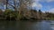 Waikato River flowing gently along a section of bank