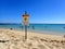 Waikiki Beach with Warning Monk Seal May Bite Sign