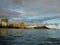 Waikiki Hotel building, clouds, and Diamond Head Crater in the distance on Oahu, Hawaii viewed from the water