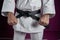 Waist of a karate master with black belt rank