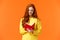Waist-up portrait attractive redhead girl 20s write in her diary, fill-in to-do list or personal schedule in new