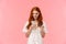 Waist-up portrait charismatic cute redhead woman in white dress, insert her credit card number at smartphone, buying