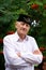 Waist up portrait of an elderly man  Muslim in a skullcap, outdoors