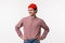 Waist-up portrait upbeat and enthusiastic young hipster guy in red beanie and glasses, with checked shirt, standing