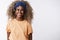 Waist-up shot friendly and sincere, attractive african-american blond girl with afro hairstyle, stylish headband and