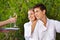 Waiter giving couple champagne