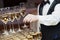 Waiter with glass of champagne