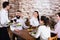 Waiter placing order in restaurant