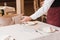 Waiter putting wineglasses on table