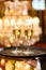 Waiter served champagne glasses on tray in restaurant