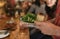 Waiter serving a healthy salad to bistro customers