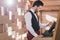 Waiter standing at cash register