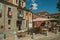 Waiter working on small square with restaurant at Avila