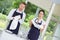 Waiters setting wedding table at restaurant