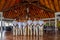 Waiters and waitress team in uniform standing in the bar