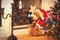 Waiting for Christmas miracles. Santa bear toy and xmas lights