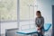 Waiting patient. A woman waiting for medical examination by sitting on treatment couch