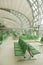 Waiting room with chairs in airport corridor