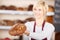 Waitress Giving Sweet Bread In Cafe