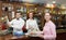 Waitress holding tray with glasses