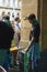 Waitress pouring Cider in a traditional event in San Sebastian.