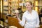 Waitress presenting cup of coffee or tea