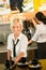 Waitress serving coffee cups making espresso woman