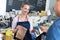 Waitress serving customer at the coffee shop