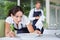 Waitress setting table in restaurant