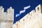 Waiving flags on King David's Tower, citadel. Jerusalem