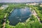 Wake cable park on lake Wakeboarding in the city aerial drone photo