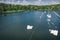 Wake cable park on lake Wakeboarding in the city aerial drone photo