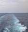 Wake of the cruise liner on the water of the Sea