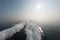 Wake of a fast catamaran passenger ferry on a sunny day with calm seas