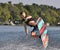 Wakeboard jump over wave